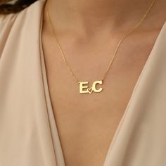 "💖✨ Personalised Double Letter Necklace - 14K Gold Plated 💖✨ Immerse yourself in the exquisite charm of our 14K Gold Plated Personalized Heart 2 Letters Love Necklace ✨. This stunning piece of jewelry is more than just an accessory; it's a symbol of love and personal connection 💖. Meticulously crafted with precision and care, the heart pendant boasts two delicately engraved letters, forming a unique and deeply meaningful design 💕. Whether it's a birthday celebration 🎂 or Mother's Day 🌸, th Elegant Nameplate Initial Necklace For Anniversary, 14k Gold Initial Pendant Name Necklace For Anniversary, Yellow Gold Initial Necklace For Birthday, 14k Gold Initials Name Necklace For Anniversary, Personalized 14k Gold Initial Necklace For Anniversary, Classic Name Necklace With Hallmark For Anniversary, 14k Gold Anniversary Name Necklace With Initial Pendant, Classic Initial Necklace For Anniversary And Mother's Day, Elegant Yellow Gold Initial Necklace For Birthday