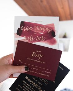 a person holding up some cards in their hand with the words, wedding stationery and lipstick on them