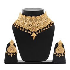 antique gold-plated finish with intricate detailing includes matching earrings for a complete look ideal for bridal wear, festivals, and special events high-quality craftsmanship for an elegant appearance adds traditional charm to any outfit Cheap Gold Sets For Navratri, Gold Kundan Sets For Reception, Intricate Design Jewelry Sets For Receptions, Festive Temple Jewelry Sets For Formal Occasions, Festive Gold Tikka With Intricate Design, Formal Festive Temple Jewelry Sets, Gold Sets For Reception And Diwali, Gold Traditional Wear With Pallu For Reception, Elegant Gold Lehenga With Intricate Design