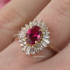 Beautiful Vintage Inspired Ruby Ring ►Base Metal: 925 Sterling Silver ►Plating: 14K Yellow Gold Main Stone: RubyColor: RedGemstone Creation: Lab-Grown Stone Shape: Oval CutGem size: 7.0 x 5.0 mmCarat Weight: 0.76 ct. (Approx.) Accented With Simulated Diamonds ►Please be aware that plated jewelry can wear off over time, if this is a concern we would suggest going with the sterling silver or solid gold jewelry option. ►Style: Art-Deco Stackable Engagement Ring, Ruby Ring Vintage, Silver Engagement Ring, Ruby Engagement Ring, Sterling Silver Engagement Rings, Moissanite Jewelry, Silver Engagement Rings, Solid Gold Jewelry, Anniversary Gift For Her