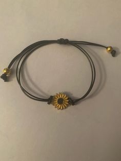 adorable sunflower bracelet Casual Adjustable Bracelet Jewelry, Elegant Adjustable Sunflower Design Jewelry, Elegant Adjustable Sunflower Jewelry, Cute Gold Bangle Jewelry, Yellow Resizable Jewelry For Friendship, Cute Adjustable Metal Charm Bracelet, Adjustable Metal Charm Bracelet, Cute Style, Cute Gold Bangle Bracelet, Dainty Flower-shaped Metal Bracelets