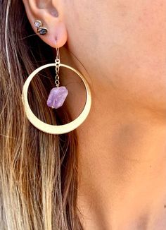 Gorgeous light weight large gold hoops with 100% real Amethyst stones. 14k gold plated lightweight hoops. Perfect boho chic look and February birthday gifts! Regular hoops- texture ridges Hammered hoops- beautiful rustic hand hammered detailing. Please see photo. 💜Amethyst crystals are potent stones to aid healing and they bring intense spiritual growth. ♥ Increases nobility ♥ Spiritual awareness ♥ Psychic abilities ♥ Inner peace and healing ♥ Healing of body, mind & soul ♥ Positive transfo 14k Gold Filled Gemstone Hoop Earrings, Gold Hoop Spiritual Jewelry, Dainty Drop Earrings With Natural Stones, Gold Plated Single Earring In Circle Shape, Handmade Purple Jewelry In 14k Gold Filled, Single Circle Gold-plated Earring, Hoop Earrings With Natural Stones For Gift, Gold Amethyst Dainty Earrings, Purple Hoop Jewelry For Gift