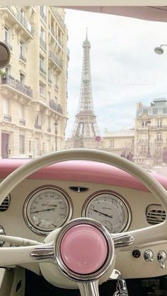 the interior of an old car in front of the eiffel tower