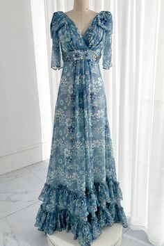 Blue Chiffon A-line Maxi Dress, Elegant Light Blue Lined Dresses, Fitted Silk Chiffon V-neck Maxi Dress, Elegant Blue Chiffon Dress For Garden Party, Blue Georgette Dresses With Ruffles, Flowy Chiffon Dress Lined, Flowy Lined Chiffon Dress, Fitted Light Blue Chiffon Dress, Elegant Light Blue Floral Chiffon Dress