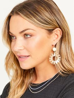 These shiny floral earrings elevate any outfit! Add these statement earrings to a flowy dress and some wedges for a complete look! Chic Gold Flower Earrings For Summer, Spring Flower Earrings For Parties, Elegant Summer Beach Hoop Earrings, Elegant Flower Earrings For Beach, Feminine Summer Flower Drop Earrings, Elegant Spring Hoop Earrings, Trendy Earrings For Spring, Chic Spring Earrings For Party, Glamorous Party Earrings For Spring