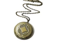 "Visit our full collection of vintage treasures at www.upcycledworks.com This Locket necklace is on a brass chain and measures 28\" in length. The locket measures 1 3/4\" round. It opens for your favorite photograph. Picture size for this locket is 1 1/4\" round. You will have to find a photo that fits and glue it into place. Sorry we do not engrave at this time. The perfect gift for all ages! H O W * T O * O R D E R: 1. Select options from the dropdown menu 2. Add to cart and proceed to checkou Picture Locket, Mother Daughter Gifts, Vintage Lockets, Pocket Watch Chain, Upcycled Jewelry, How To Make Shorts, Picture Size, Watch Necklace, Locket Necklace