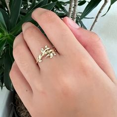 14k Solid Gold Iconic Leaf Ring. Real Gold Floral Ring For Her. Vine Leaf Floral Wedding Band. 💙 Our jewelry is handcrafted with love and great care at San Francisco Bay! All of our items are 14k stamped for authenticity. 💙 You will receive them exactly as pictured. We don't use any filters, all photos are authentic and unedited.  💙 Figure width: 11.00 mm. The ring material is 14k Solid gold, should not be confused with gold plating or filling. It won't tarnish or fade over time. 💙 We're off Adjustable Yellow Gold Wedding Jewelry, Adjustable Yellow Gold Jewelry For Wedding, Delicate Gold Flower Ring For Wedding, Delicate Gold Jewelry With Prong Setting, Yellow Gold Wedding Toe Ring, Rose Gold 14k Stamped Wedding Jewelry, Dainty Gold Flower Ring Stamped 14k, 14k Gold Flower Toe Ring For Wedding, Heirloom Wedding Jewelry Tarnish Resistant