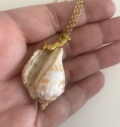 "Hand painted seashell  Gold painted accents. Mermaid charm pendant. 24\" Chain Shell is 1.5\" long. Shells have imperfections not a smooth surface.  They have been tumbled by the waves. Gift box is included. Custom orders welcomed. Free shipping within the USA USA Seller" White Shell Charm Necklace Gift, Pendant Shell Necklace With Lobster Clasp As Gift, Ocean-inspired Shell Necklace With Lobster Clasp For Gift, Shell Necklace With Lobster Clasp As Gift, Shell-shaped Charm Necklaces Made Of Shell As Gift, Shell Jewelry With Lobster Clasp As Gift, White Shell Charm Necklace As Gift, White Shell Charm Necklace For Gift, Shell Pendant Charm Necklaces For Gifts