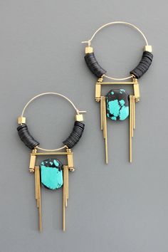 Gold plated brass hoops with synthetic turquoise and black vulcanite. Each earring weighs .29 oz. and measures 3.375 inches long. Turquoise Hoop Earrings, Turquoise Hoops, Turquoise And Black, Brass Hoops, Metal Surface, Ear Rings, Fashion 2024, Color Stone, Diy Schmuck