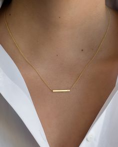 "14K solid gold Bar necklace with a tiny diamond , comes in the gold color of your choice, and length of your choice, dainty and absolutely amazing! The perfect everyday necklace, by itself or layered. made in L.A. Size: Approx. 1\" Diamond: 0.01 ct wt Ships in 5 to 7 business days Comes gift ready in our beautiful branded jewelry box." Everyday Yellow Gold Rectangular Bar Necklace, Rectangular Yellow Gold Bar Necklace For Everyday, Everyday Rectangular Yellow Gold Bar Necklace, 14k Gold Rectangular Pendant Bar Necklace, Delicate 14k Gold Bar Necklace, Minimalist 14k Gold Bar Necklace With Rectangular Pendant, Minimalist Yellow Gold Bar Necklace With Rectangular Pendant, Classic Everyday 14k Gold Bar Necklace, Minimalist 14k Yellow Gold Bar Necklace