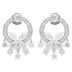 Add a touch of timeless elegance to your jewelry collection with these exquisite Wedding Diamond Earrings. Handcrafted with meticulous attention to detail, these stunning earrings are sure to capture hearts and turn heads wherever you go. These are perfect Gift for Mom, Fiancée, Daughter, Girlfriend, Wife and Grandmother. It can be worn on any occasion. Best Gift for Valentine’s Day, Mother’s Day, Easter, Christmas, New Year, Birthdays or any other special day. Say it with a diamond! Features: ✦ Timeless Brilliant Cut Cluster Earrings For Wedding, Wedding Cluster Earrings With Diamond Cut In Platinum, White Diamond Earrings With Halo Design For Evening, Formal White Gold Diamond Earrings With Elegant Design, Luxury Bridal Earrings With Prong Setting For Formal Occasions, Elegant White Gold Bridal Earrings With Halo Design, Luxury Diamond White Cluster Earrings For Wedding, Timeless Diamond Drop Earrings For Wedding, Exquisite White Gold Diamond Earrings With Elegant Design