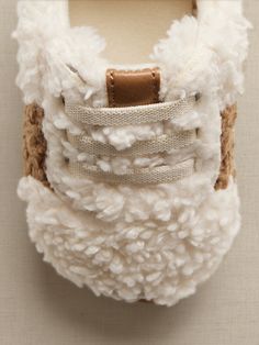 Entreating baby to take a walk in cozy, soft bliss, this beautiful sherpa sneaker will make every step a bit more luxurious.  SUSTAINABILITY: Made with recycled polyester.  Elastic straps.  Standard fit.  To find the best fit, consult the size chart Baby Ugg Booties, Best Toddler Snow Boots, Fleece Baby Shoes, Sheepskin Baby Slippers, Baby Uggs, Take A Walk, A Walk, Banana Republic, Walk In