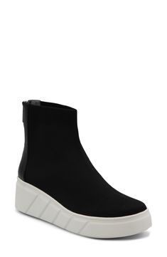 A well-cushioned footbed and stretchy knit upper bring lasting comfort to this fashion-forward sneaker kicked up on a textured platform wedge. 2" heel; 1" platform Back zip closure Cushioned footbed with arch support Textile upper/synthetic lining/rubber sole Imported High-top Synthetic Wedge Sneakers With Thick Bottom, Synthetic Platform Wedge Sneakers, Synthetic Wedge Heel Platform Sneakers, Modern Wedge Heel Platform Sneakers, Trendy Ankle-high Synthetic Wedge Sneakers, Modern Platform Wedge Sneakers In Synthetic Material, Modern Synthetic Platform Wedge Sneakers, Black Synthetic Wedge Sneakers With Thick Bottom, Sports Wedge Sneakers With Platform