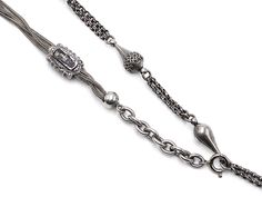 "Two antique Victorian nickel silver watch chains have found a life together--connected by their clasps to make one necklace. The different designs of the chains are highly complementary to each other and additional charms can easily be connected. Depending on where the clasps are connected, two possibilities for necklace length are 22 1/2\" or 19\" but the fun of this concept is the way you can play with it and make different connections--such as wrapping it around a wrist for a bracelet. The c Squash Blossom Necklace, Watch Chain, Nickel Silver, Multi Strand Necklace, White Ring, Silver Watch, Multi Strand, Eternity Ring, Chains Necklace