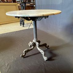 an old table is on display in a room