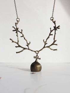 "Magic branch necklace inspired by the beautiful forest and its treasures. Two detailed bronze colored branches encapsulate the spirit of trees and hold a large acorn cap in the middle.  The adjustable length of the necklace makes it perfect to wear at the base of your neck or a bit longer. It is really feminine and versatile. The branches have a dark old bronze-golden finish, are linked with jump rings and hung onto old bronze color link chain necklace.  { S i z e  } ~ 18 inches around your nec Forest Jewelry, Acorn Necklace, Branch Earrings, Branch Necklace, Bohemian Chic Fashion, Magic Forest, Beautiful Forest, Bib Necklaces, Deer Antlers