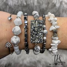 White, gray and silver beaded bracelet stack. Made with the gemstone bead Howlite. Beautiful stone which is good for calming and stress relief. Small-7" Medium-7.5" Large-8" Please measure your wrist to ensure correct size. Each bracelet is made to order so correct sizing is recommended before ordering. Using a fabric tape measure, measure just under your wristbone and choose the size closest to your exact measurement. How to care for your beaded bracelets: **Always put your bracelet on by rolling it over your hand without excessive pulling. Try not to stretch it over your hand. **Keep bracelets away from soap, perfumes, hair and skin care products, sunscreen, salt water etc... Many everyday products that we use can degrade the quality of the elastic over time. Adjustable Gray Bracelets With Faceted Beads, Adjustable Gray Bracelet With Faceted Beads, Gray Adjustable Bracelets With Faceted Beads, Adjustable Gray Stretch Bracelet For Gift, Adjustable Gray Stretch Bracelet Gift, Gray Adjustable Stretch Bracelet For Gift, Gray Adjustable Stretch Bracelet As Gift, Gray Beaded Bracelets With Faceted Beads As A Gift, Gray Faceted Beaded Bracelets For Gifts