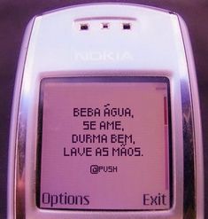 an old cell phone with the message'stop thinking about him, he sucks '