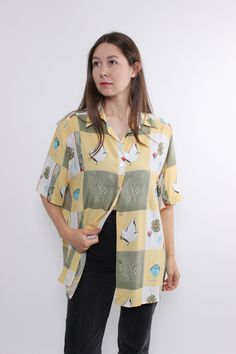 Hi! This is vintage yellow color short sleeves blouse with buttons closure and flowers pattern. This button front shirt made of  VISCOSE. The model in the photo is 170 cm tall and is wearing a LARGE size blouse.   D/NL 44; F/B 46; GB 18 - sizes on the tag. But, be careful, this is a vintage size, it is better to check the measurements below in the product description. Sleeve - 14cm / 5.51inch;  Width - 60cm / 23.62inch;  Length - 72cm / 28.34inch. All measurements are taken seam to seam while ly Vintage Printed Summer Blouse, Vintage Printed Blouse For Summer, Yellow Tops With Vintage Print For Summer, Yellow Vintage Print Top For Spring, Yellow Top With Vintage Print For Spring, Vintage Print Short Sleeve Hawaiian Shirt For Spring, Spring Vintage Print Hawaiian Shirt With Short Sleeves, Spring Vintage Print Hawaiian Shirt, Vintage Print Hawaiian Shirt For Spring