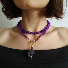 < Long glass beaded necklace with amethyst stone pendant > Very original and elegant combination. The stone is natural amethyst. Amethyst is the stone of St. Valentine and faithful love. It carries the energy of fire and passion, creativity and spirituality. This necklace can be beautiful accent to any look! > Necklace length - 89 cm (35 in) > Necklace weigth - 78 gm Handmade Amethyst Pendant Beaded Necklaces, Handmade Amethyst Pendant Beaded Necklace, Purple Amethyst Pendant Crystal Necklace, Purple Amethyst Faceted Bead Crystal Necklaces, Handmade Purple Agate Beaded Necklaces, Purple Amethyst Crystal Necklaces With Faceted Beads, Amethyst Crystal Necklace With Faceted Beads As Gift, Purple Amethyst Crystal Necklace With Faceted Beads, Purple Amethyst Necklace With Faceted Beads