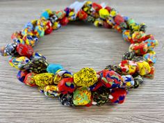 multicolored lollipop bracelet on wooden table