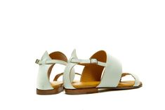 Sophisticated summer attitude in white elegant strappy sandals. There is no more to say, just wear your new pair of sandals and enjoy the summer. This pair of sandals are ultimate in everyday casual, perfect balance between beach-ready and urban appropriate. Hand crafted from the softest leather and cushioned for extra comfort and with wide straps they make the most comfortable fit. This sandals are perfect choice for every day or night of the summer. Style yours with everything from dresses to Leather Drawstring Bags, Strappy Sandals Flat, Boho Handmade, Handmade Sandals, Sandals Flats, Wedding Boho, Womens Summer Shoes, Greek Style, Star Shoes