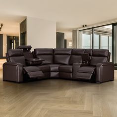 a living room with a brown leather couch and recliners in front of large windows