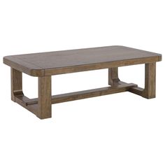 a wooden table sitting on top of a white floor