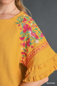 Umgee Linen blend top with layered flounce sleeves and embroidery. Fringe hemmed. Super cute blouse! Color: Mustard Sizes: S-M-L True to sizeOur model is 5' 9" wearing a small 55% Linen, 45% Cotton, importedO5/K7342 Tops 2022, Tiered Sleeve, Fall Sewing, Embroidered Linen, Cute Blouses, Fashion Designs, Flounce Sleeve, Spring Tops, Sewing Tips