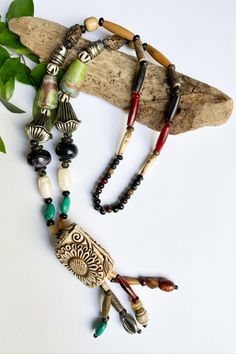 The Lucy Long African Beaded Layering Necklace – Spirited Boutiques Beaded Sunflower, Pearl Jacket, Layering Style, Bohemian Style Clothing, Sunflower Necklace, Iconic Dresses, Necklace Layering, Layered Fashion, Magnolia Pearl