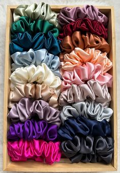 Choose our most luxurious and stylish scrunchies for you and your loved ones. Materials: - Charmeuse satin silk fabric - a type of mulberry silk that has a satin finish.  Charmeuse silk is very gentle and soft for all hair types and its satin finish creates a modern and luxurious look - 6mm elastic band - 6~7 inches long Actual colors may differ slightly from those in the pictures. Size:  Regular ~ 1.5 inches; wraps hair 2-3 times Handmade in Canada. NOTE: Pure silk is made from a natural protein-fiber obtained from the larvae of the mulberry silkworm; it has a tendency to wrinkle depending on the variety.  Please try to keep your silk scrunchies away from water or wet hair. Diy Hair Scrunchies, Scrunchie Styles, Mindful Moments, Hair Tie Accessories, Mulberry Silk Fabric, Teacher Personalized, Velvet Scrunchie, Natural Protein, Hair Accessories Collection