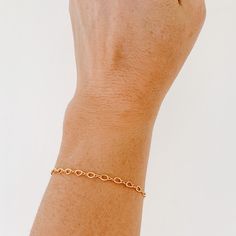 This gorgeous gold chain bracelet is simple and elegant. It looks amazing worn solo but plays well with other ADORNED favorites. 14k gold filled lobster clasp closure length: 6.5" and 1" extender Dainty Gold Chain, Gold Chain Bracelet, Figure 8, Gold Bracelet Chain, Love Gifts, Pure Silver, Delicate Bracelet, Jewelry Care, Chain Bracelet