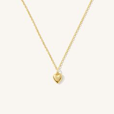 The Tiny Heart Necklace is the sweetest addition to any collection. Dainty yet durable, this necklace is ready for everyday wear, so you can feel the love on any occasion - date night, brunch with friends, or a coffee run by yourself! It also makes a precious gift for someone special to you. DETAILS Necklace length: 16" with 2" extender 14k gold filled -or- sterling silver necklace, jump ring, & findings 14k gold filled -or- sterling silver 8mm x 6.5mm heart charm Safe for sensitive skin & show