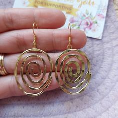 A beautiful earrings made of stainless steel earring hooks and zinc based Alloy pendant in spiral shape . It can be a gift for yourself or your loved ones on any occasion.  Care of jewellery  Keep it dry at all times.  No contact with water or any liquids.  Despatched within one day after placing your order, FREE DELIVERY WORLDWIDE. WHY YOU'LL LOVE ❤️ IT 😊 📌it's suitable to wear everyday. 📌using long lasting materials 📌handmade earrings for women made with attention to details  📌 a beautifu Gold Stainless Steel Earrings As Gift, Gold Stainless Steel Earrings For Gift, Nickel-free Spiral Hoop Earrings As Gift, Nickel-free Spiral Hoop Earrings For Gift, Nickel Free Spiral Hoop Earrings Gift, Spiral Earrings With Ear Wire For Gifts, Spiral Earrings With Ear Wire As Gift, Handmade Spiral Earrings As Gift, Pierced Stainless Steel Hoop Earrings As Gift