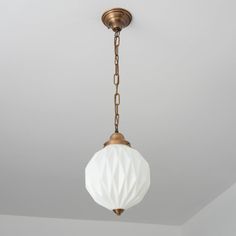 a light fixture hanging from the ceiling in a room