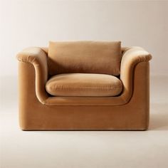 a brown chair sitting on top of a white floor