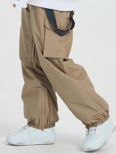 It's impossible to beat these jeans ski pants' bagginess and steezy colorways. Styled to make every fit look amazing, they’re guaranteed to be your favorite winter investment. Designed with 2 front zipper pockets, 2 back pockets, 2 cargo pockets, snow-repelling elastic cuffs and leg vents, there's no way you won’t enjoy your day in these baggy snow pants. Features Include: Waterproofing: 15K Waterproof / 10K Breathable Fabric: Polyester, OMINI-HEAT tech applied to save more heat. Fit: Baggy Insu Baggy Winter Streetwear Bottoms, Baggy Urban Parachute Pants For Winter, Hip Hop Style Straight Leg Outdoor Bottoms, Urban Style Winter Cargo Jeans With Side Pockets, Urban Baggy Parachute Pants For Winter, Winter Cargo Pocket Parachute Pants For Outdoor Activities, Urban Cargo Jeans With Side Pockets For Winter, Winter Outdoor Parachute Pants With Cargo Pockets, Winter Casual High Waist Parachute Pants