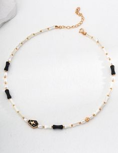 Product Detail Length:390mm+50mmMaterial: Silver, 13.0*5.0mm Black Onyx Beads, 4.0*6mm Natural Freshwater Pearl Gold Plated, 4.0*7.0mm Shell Beads, ResinTech: HandmadeStyle: Chill/Elegant/ChicOccasion: Event/Work/Party/Weekend Casual/Going OutProduct Note: 1. All pictures are taken in real-life scenarios, and color variations may exist under different lighting conditions.2. This is a model picture of the piece you will receive. Each piece is unique and one of a kind. Maintenance advice 1. It is recommended to keep the item sealed to avoid oxidation. 2. Do not wear while bathing. Black Necklaces With Round Letter Beads, Black Beaded Necklace With Letter And Round Beads, Black Beaded Necklace With Letter Beads, Black Necklace With Colorful Oval Beads, Black Necklaces With Colorful Oval Beads, Black Necklace With Oval Spacer Beads, Black Beaded Necklaces With Heart-shaped Beads, Black Beaded Necklaces With Heart And Round Beads, Pearl Beaded Necklace