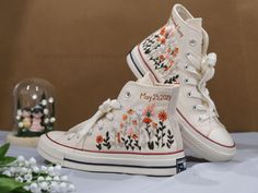 " Custom Embroidered Wedding Converse, White Flowers Embroidered Sneakers for Bride, Embroidered Wedding Reception Shoes, Wedding Gifts LP"   CONVERSE ∙ EMBROIDERED ∙ WEDDING SHOES * Material: High-quality premium cotton embroidery thread, colorfast * Dimensions: Tailored to your selected US shoe size * Finish: High-end embroidery ∙ Sharp threading ∙ Colorfast * All shoes are custom-made by hand with Love and Care in our workshop ♡ 🎁 UNIQUE POINTS 🎁 Includes 1 pair of socks Free custom name or Embroidered Converse Wedding, Embroidered Sneakers For Wedding, Wedding Low-top Sneakers With Floral Embroidery, Spring Wedding Embroidered Sneakers, White Wedding Sneakers With Custom Embroidery, White Wedding Sneakers For Summer, White Embroidered Closed Toe Wedding Shoes, Embroidered Round Toe Wedding Shoes, Spring Wedding High-top Sneakers