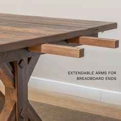 a wooden table with an extra extension to the top and bottom section that has been made out of wood