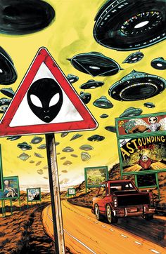 an alien crossing sign in the middle of a road with aliens flying over it and cars passing by