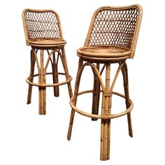 two wicker bar stools on white background