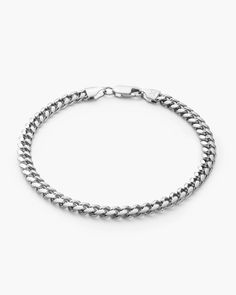 Elevate your wristwear with our silver Cuban Link Bracelet Stack, a perfect union of classic charm and contemporary style. Featuring a substantial 5mm gauge paired with a sleek 3mm counterpart, this stack embodies a strength and refined elegance. Crafted from high-quality 925 sterling silver and enduring rhodium, this men's bracelet stack delivers a versatile and sophisticated addition to your collection, showcasing a timeless appeal that transcends trends. Cuban Link Chain Men, Silver Bracelet Stack, Cuban Link Bracelet, Cuban Bracelet, Mens Bracelet Silver, Solid Gold Chains, Silver Coat, Silver Chain Bracelet, Matching Bracelet