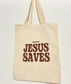 a white bag with jesus saves printed on it