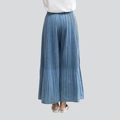 Introducing the 2023 Spring-Summer Collection the Pleated Culottes Women's Denim Pants Y2K Style. the perfect combination of timeless and vogue trend. Crafted from high-quality denim fabric. these jeans offer a flattering high-waisted fit with a rubber closure and light wash finish. With a unique year-2000 design. these divided-skirt are a testament to vogue fashion and classic charm.Why These Jeans Should Be Your Next Purchase Modern Y2K Design: Featuring a unique y2k design. these jeans are th Spring Cotton Wide-leg Pants, Spring Casual Wide Leg Pants, Spring Mid-rise Bottoms, Summer High Rise Baggy Wide Leg Pants, Chic Wide-leg Cropped Denim Jeans, Casual Baggy Wide Leg Pants For Spring, Cotton Wide Leg Bottoms, Pleated Wide-leg Pants For Summer, Washed Blue Non-stretch Straight Leg Bottoms