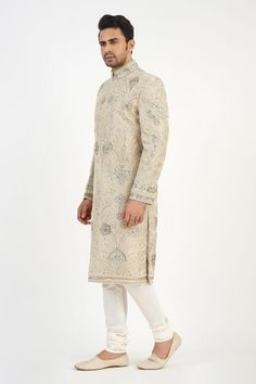 Light beige lurex sherwani with jaal, pearls and stones hand embroidery. Comes with churidar and a kurta. - Aza Fashions Formal Traditional Wear With Pearl Embroidery For Festive Season, Formal Traditional Wear With Pearl Embroidery, Formal Festive Traditional Wear With Pearl Embroidery, Traditional Formal Sherwani With Pearl Embroidery, Festive Formal Kurta With Pearl Embroidery, Bollywood Sherwani With Pearl Embroidery For Reception, Formal Bollywood Kurta With Pearl Embroidery, Traditional Drape Kurta With Pearl Embroidery For Reception, Festive Kurta With Naqshi For Reception