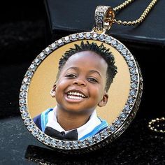 Personalized with your photo makes this pendant sentimental and everlasting. A perfect gift to keep the loved ones close to the heart. Send us your photo on our whats app (201-753-3964) and we will do the rest. Set with 64 Cubic Zirconia that can be upgraded to diamonds. Available in silver of gold tone. Comes with 24" bali style chain. Size: 1"x1" Stones1.9mm SKU: 229SUP2W Fingerprint Necklace, Tanzanite Jewelry, Picture Engraving, Fingerprint Jewelry, Bali Style, Bling Necklace, Heart Locket Necklace, Bali Fashion, Photo Necklace