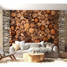 a living room with logs on the wall and a wooden table in front of it