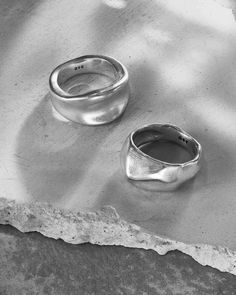 Towering peaks quake in contours, mirroring the valley that leads to the Astral Portal. Smelted demi-fine and sublime to stack or style solo. A 925 Silver ring accented with a smooth horizontal dip on its face. Forged for all genders and expressions. Sold individually. Each piece is lovingly crafted by hand, under ethical working conditions. Please allow for minor imperfections that are true to handcrafted jewelry. No two pieces are the same — every individual product is uniquely yours. Face Features, Thick Ring, Detailed Ring, Studs Earrings, Demi Fine Jewelry, Ring Fit, Ring Size Guide, Online Jewelry Store, 925 Silver Rings