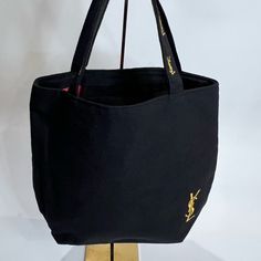 Nwot, There Are No Call Outs. This Tote Is So Cute & Classy. Luxury Black Rectangular Canvas Bag, Luxury Black Canvas Bag For Everyday, Designer Black Canvas Shoulder Bag, Black Bucket Bag With Branded Hardware And Top Handle, Black Bucket Bag With Branded Hardware, Black Bucket Bag With Top Handle And Branded Hardware, Black Canvas Bucket Bag With Double Handle, Black Canvas Shoulder Bag With Top Handle, Black Canvas Top Handle Shoulder Bag